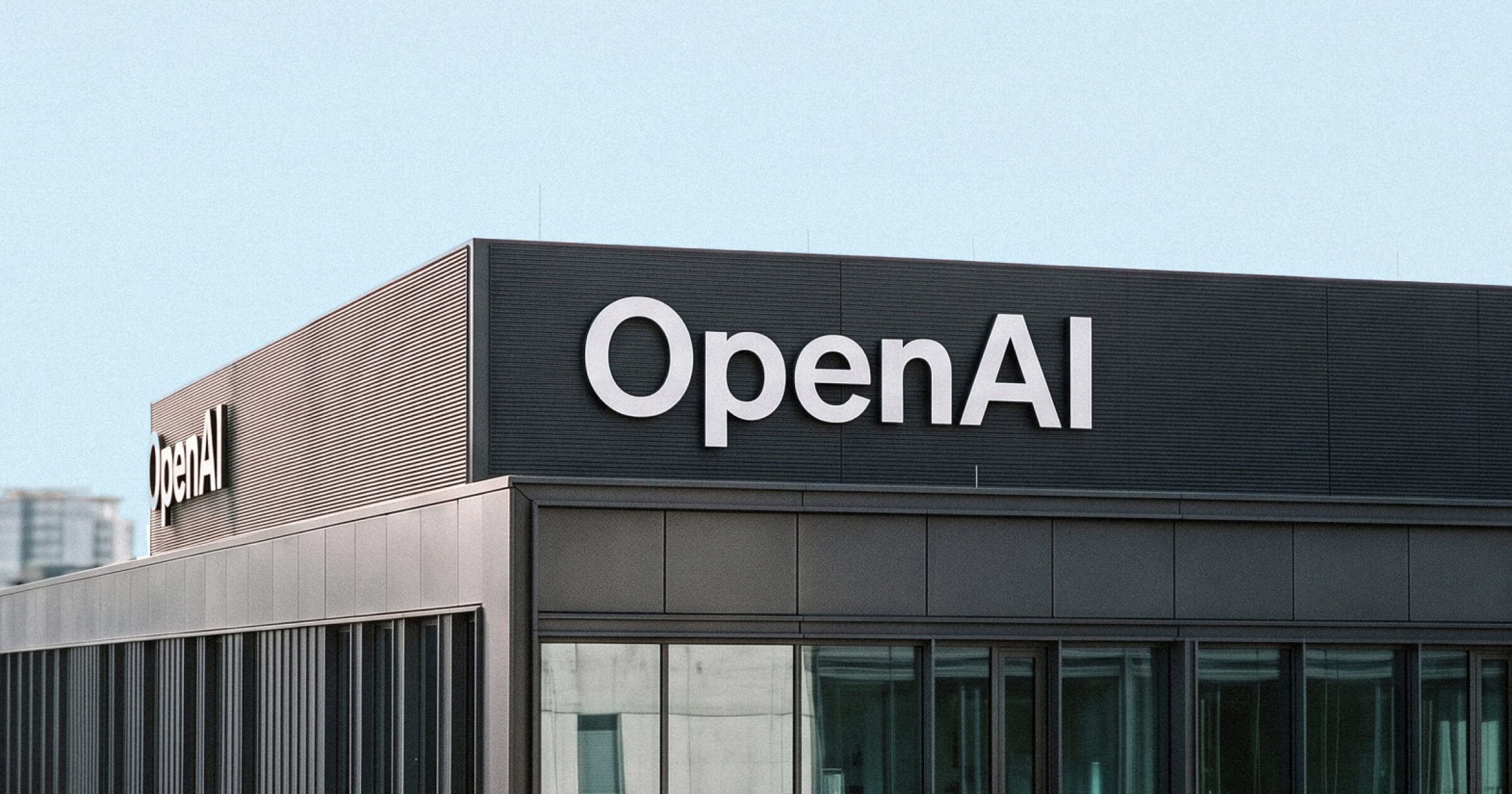 Логотип OpenAI на фоне финансового графика с ростом выручки